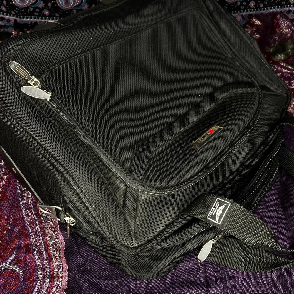 Delsey rolling carry on luggage bag